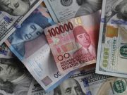 Rupiah Berakhir Stagnan di Rp 14.415/US$ Usai Bergerak Liar