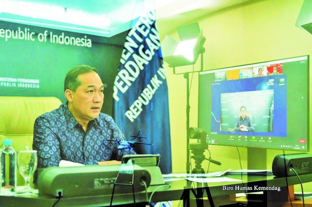 Foto: Menteri Perdagangan Muhammad Lutfi saat membuka sekaligus memberikan sambutan 