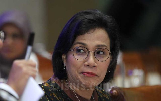 Menteri Keuangan Sri Mulyani Indrawati saat mengikuti rapat kerja antara Komisi XI DPR RI dengan pemerintah di kompleks parlemen, Jakarta, Senin (2/12/2019). Bisnis - Arief Hermawan P