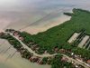 Foto udara permukiman warga yang dikelilingi hutan mangrove (bakau) di Desa Bedono, Sayung, Demak, Jawa Tengah, Rabu (24/4/2019)./Antara - Aji Styawan