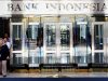 BI Proyeksi Inflasi Januari 2022 Sebesar 0,61 Persen Karyawan keluar dari pintu salah satu gedung Bank Indonesia di Jakarta, Senin, (20/1/2020).  Bisnis - Abdullah Azzam