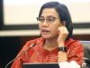 Menteri Keuangan Sri Mulyani Indrawati memberikan pemaparan dalam konferensi pers Realisasi APBN 2021 di Jakarta, Senin (3/1/2021). Bisnis - Himawan L Nugraha