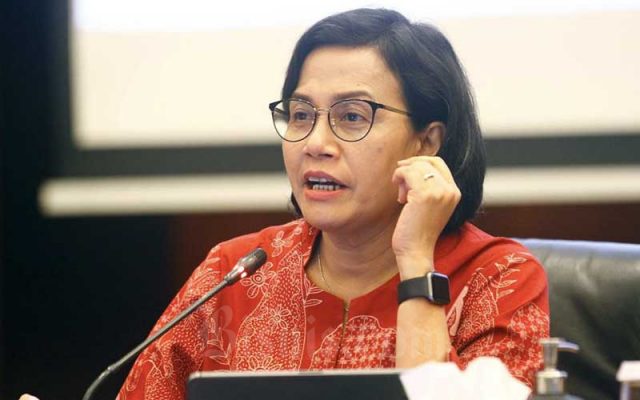 Menteri Keuangan Sri Mulyani Indrawati memberikan pemaparan dalam konferensi pers Realisasi APBN 2021 di Jakarta, Senin (3/1/2021). Bisnis - Himawan L Nugraha