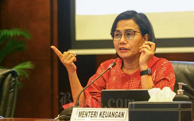 Menteri Keuangan Sri Mulyani Indrawati memberikan pemaparan dalam konferensi pers Realisasi APBN 2021 di Jakarta, Senin (3/1/2021). Bisnis - Himawan L Nugraha