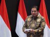 Menko Perekonomian Airlangga Hartarto memberikan sambutan saat pembukaan pembukaan perdagangan Bursa di BEI, Jakarta, Senin (3/1 - 2021). Bisnis